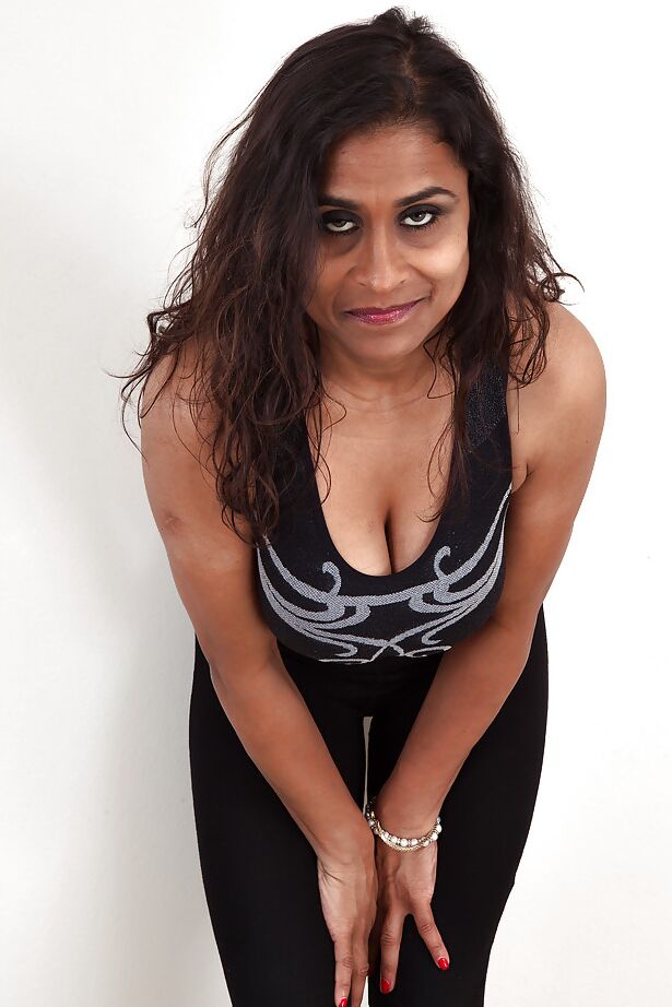 16P Dirty-minded mature lassie undressing and exposing her shaggy twat