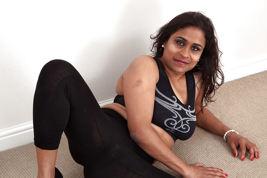 16P Dirty-minded mature lassie undressing and exposing her shaggy twat