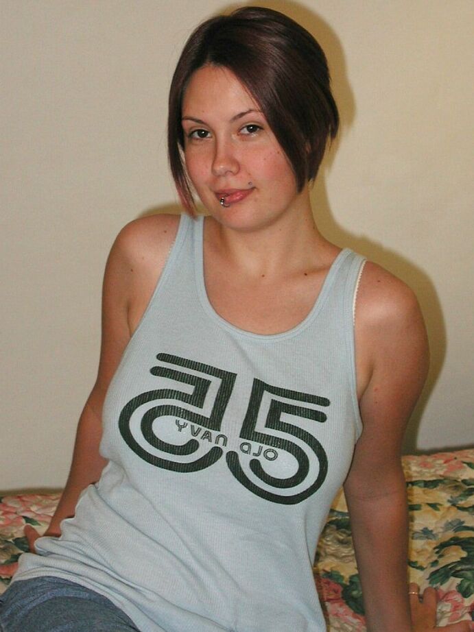 16P Amateur Latina Gwen displaying tattoos and big natural tits after undressing