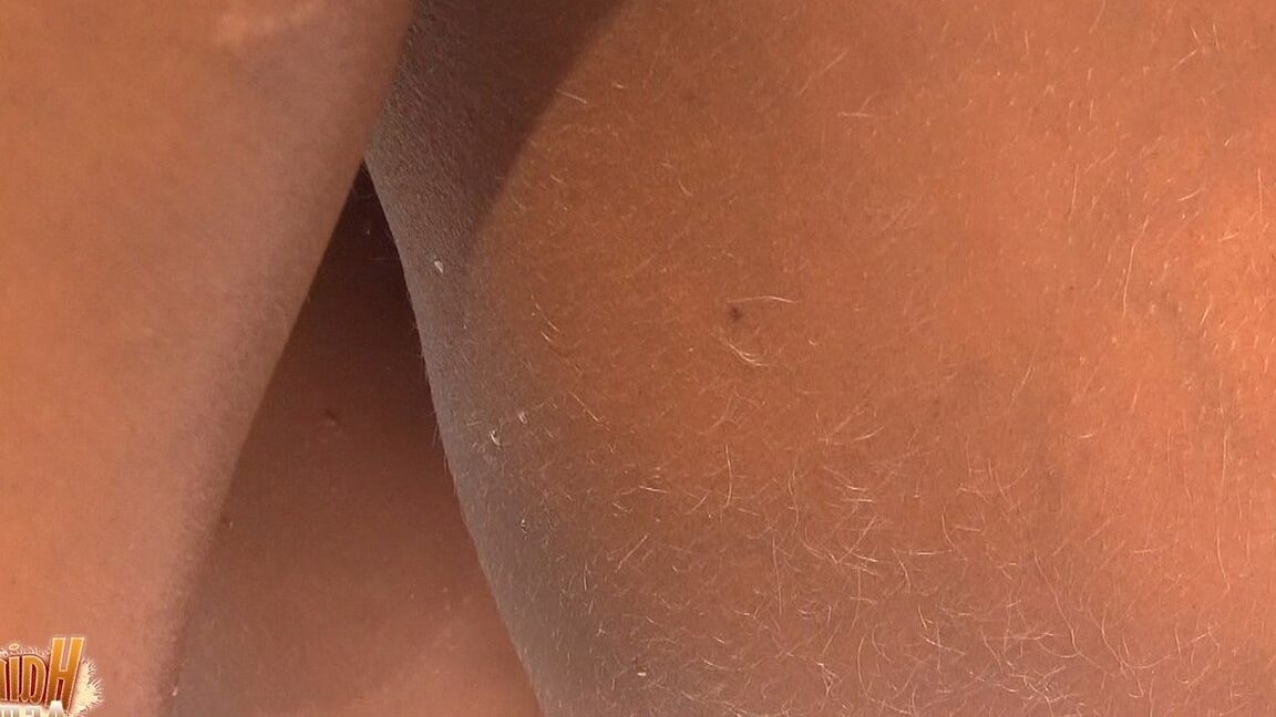 21P MILF Lori Anderson showing her hairy arms while relaxing nude at the beach