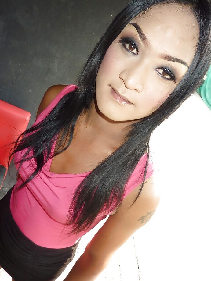 16P Elegant and slim Asian ladyboy plays with herself in the bathroom