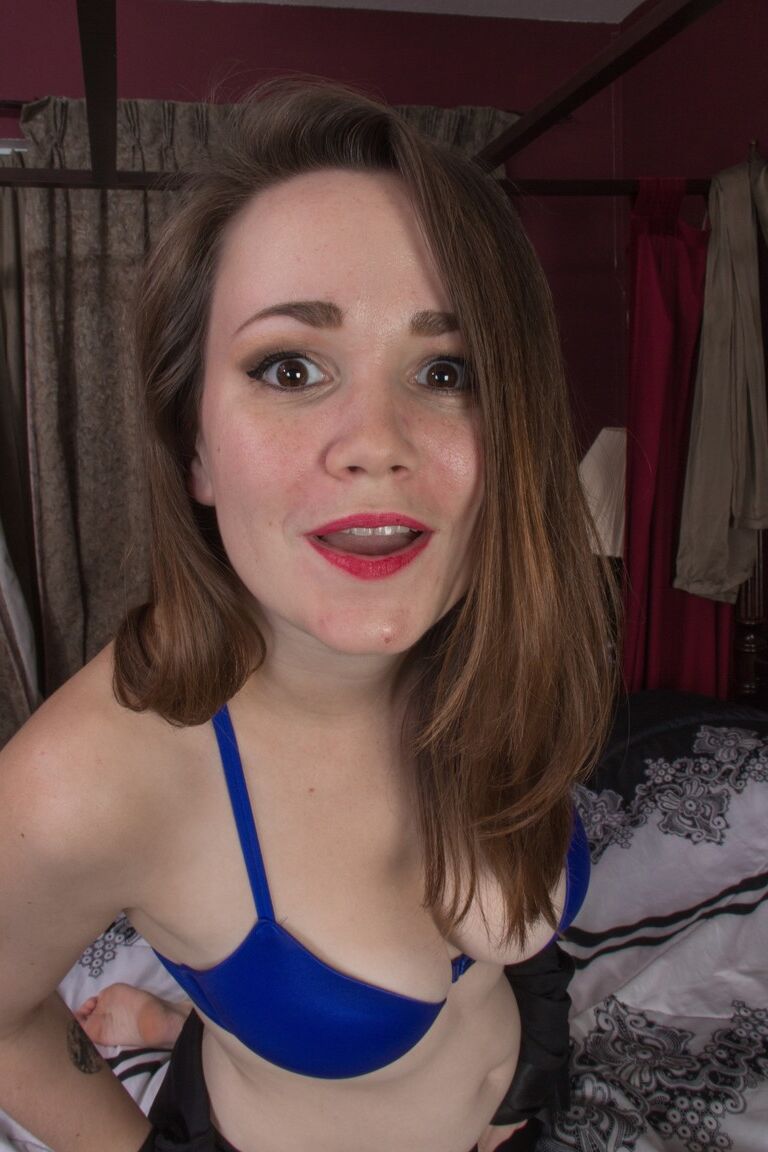 21P Petite brunette Kelly Morgan opens her legs wide and shows her fuzzy cunt