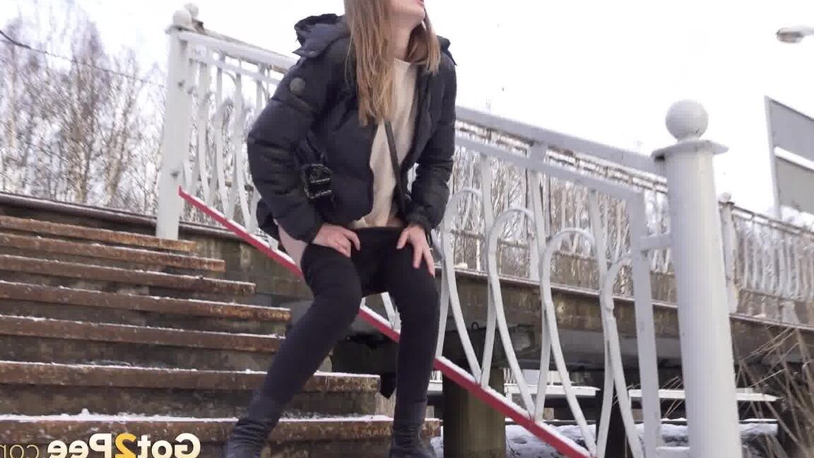 15P Caucasian female Valya takes a piss on snow-covered steps in public