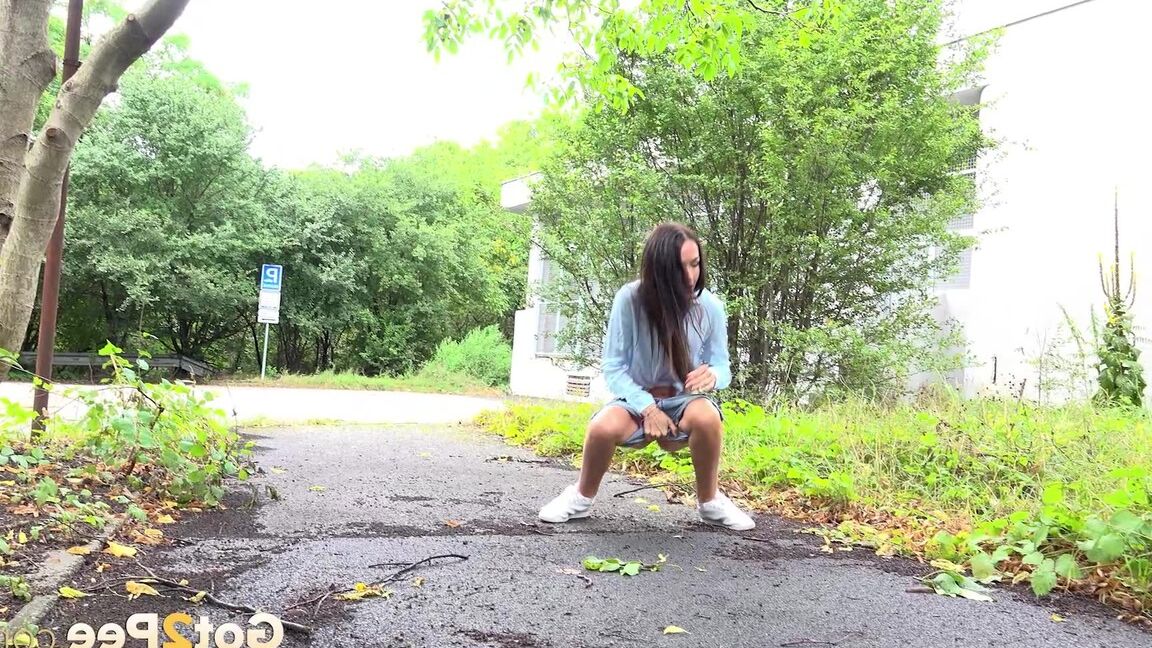 15P Dark haired Mistica needs to pee while in suburbs