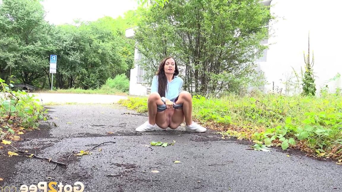15P Dark haired Mistica needs to pee while in suburbs
