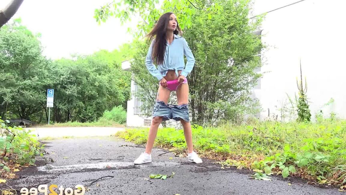 15P Dark haired Mistica needs to pee while in suburbs