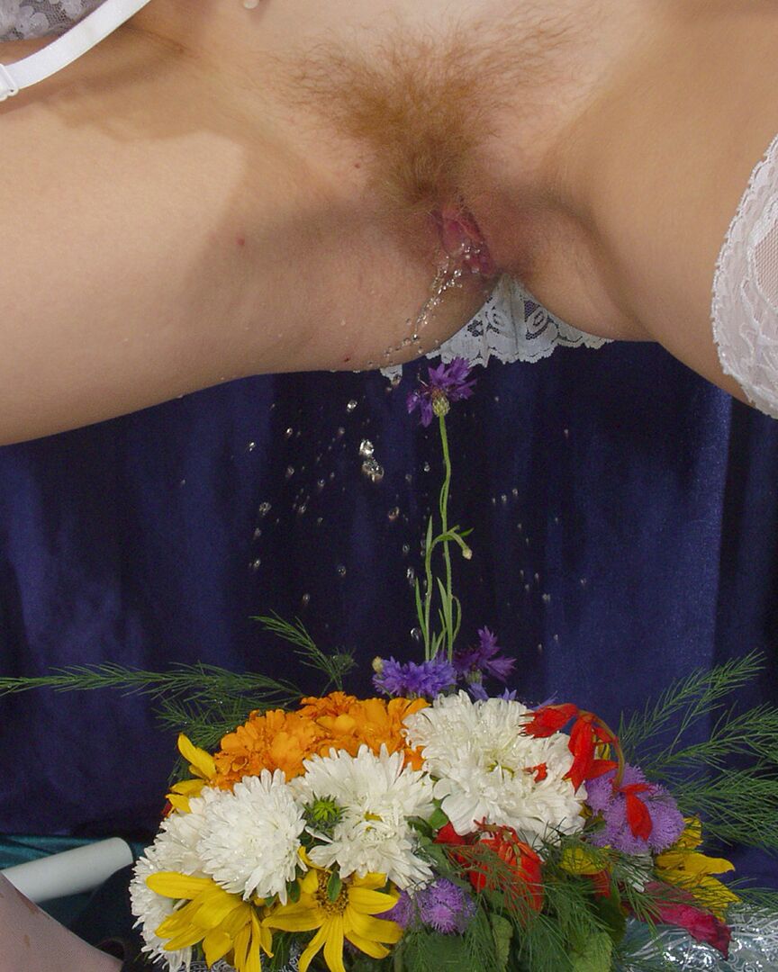 20P White girl removes maid attire before peeing on a bunch of flowers