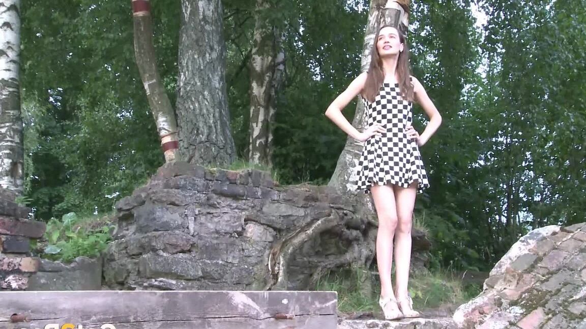 15P Pretty brunette enjoys a long piss by a main road