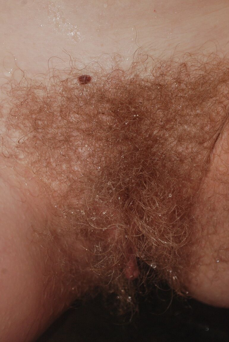 17P Petite ginger model with natural tits Valcorie shows her bush in the forest