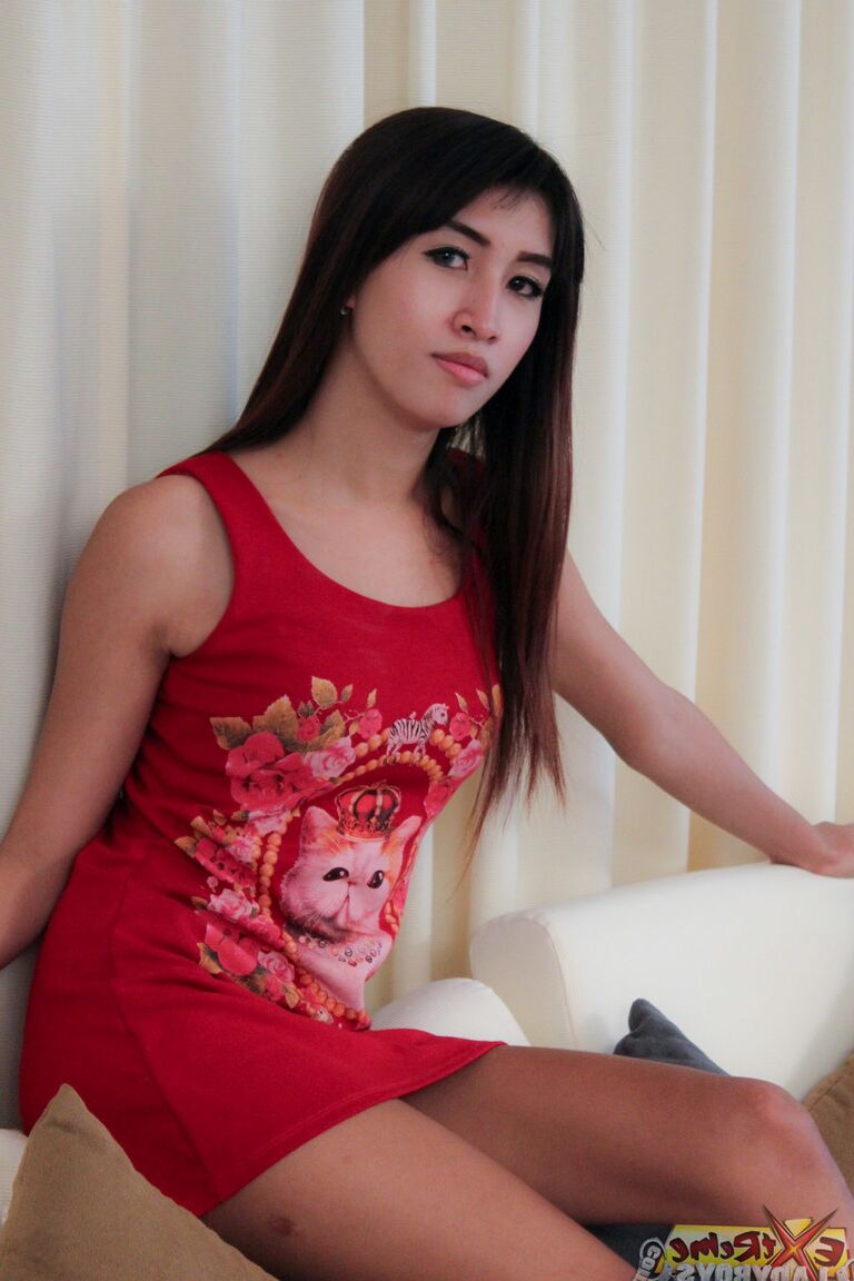 21P Slender shemale Peanut bends over a bed and gets butt banged from behind
