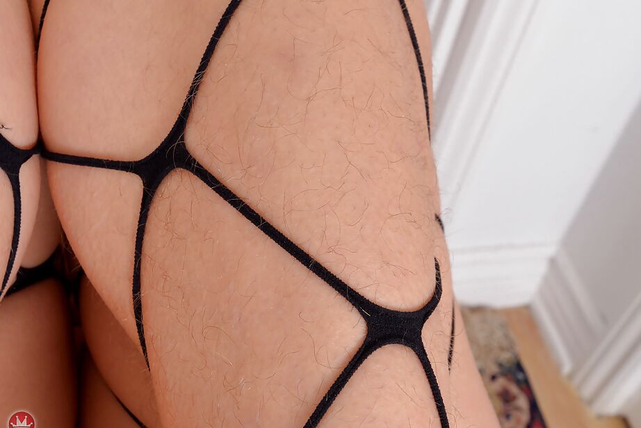 16P Mature redhead with great legs freeing hairy cunt from panties