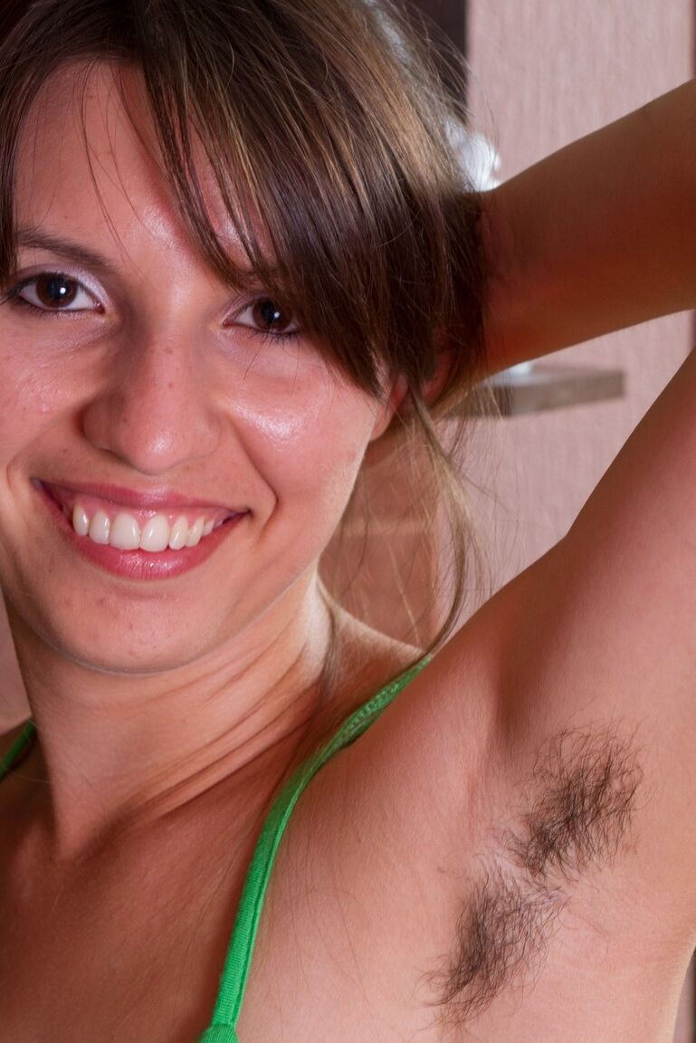 12P Natural hairy girl strips in the itchen to flaunt fuzzy armpits and pussy