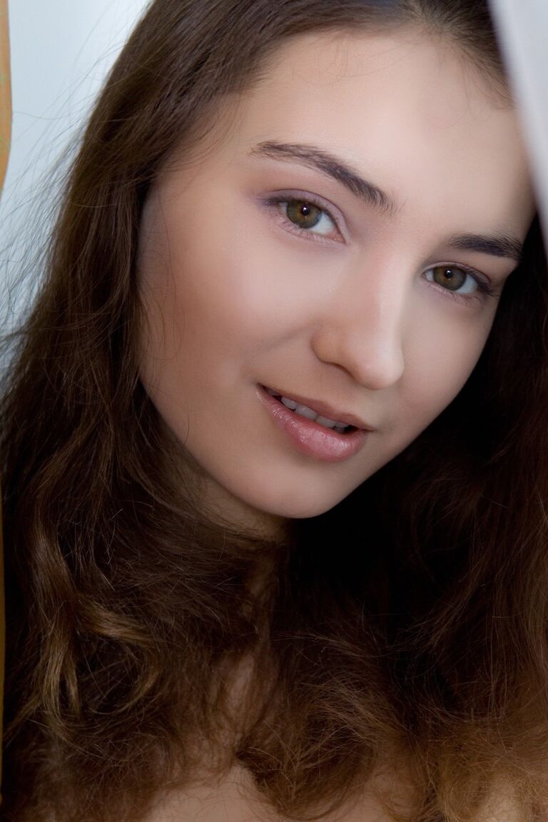 17P Adorable brunette Francine A shows off her unshaven armpits and beaver