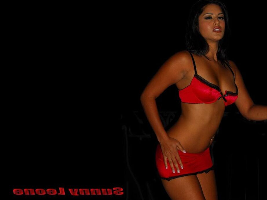 13P Hot brunette Sunny Leone models by herself during non-nude action