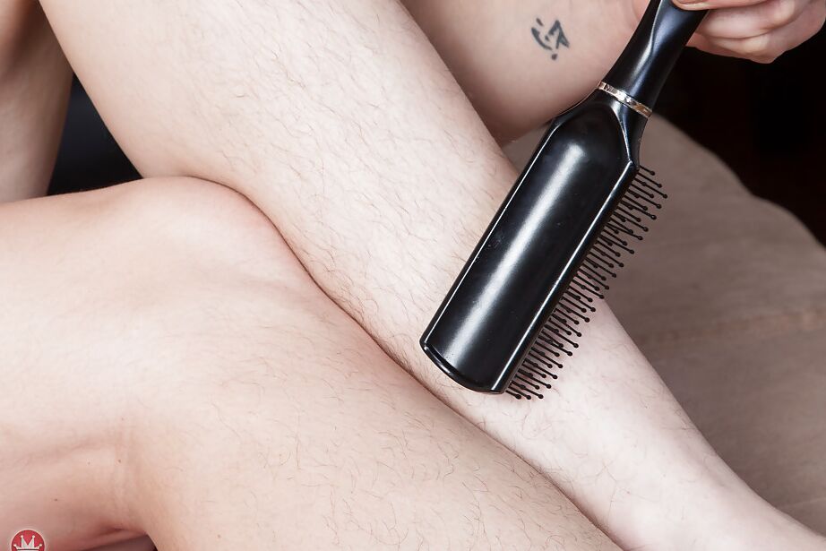 16P Hirsute solo model Sunshine taking hairbrush to furry armpits and beaver