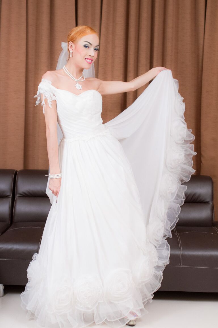 21P Ugly redhead shemale bride doffs gown for butt plug insertion & stroking