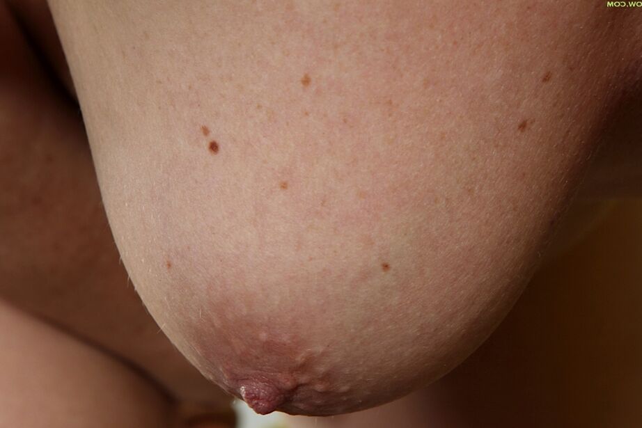 16P Experienced blonde dame Netty flaunting nice large natural granny tits