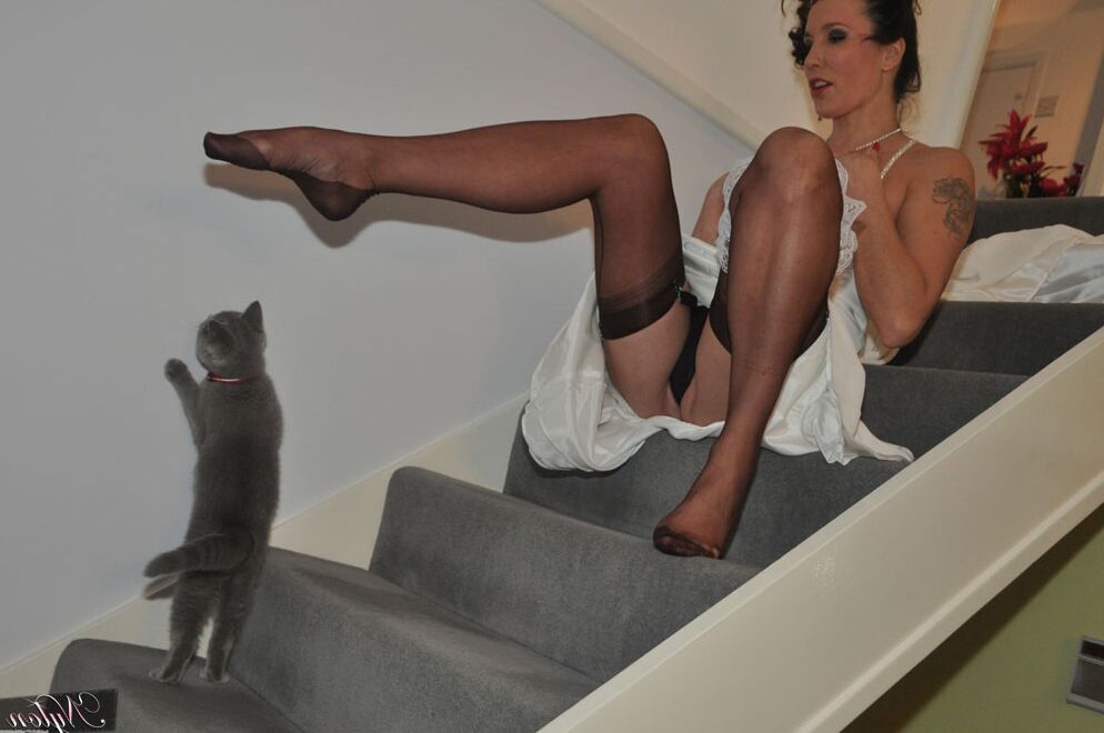 15P Older lady Nylon Jane slips off a garter while in her wedding dress and nylons