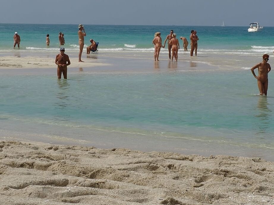 21P Alluring MILF with small tits Lori Anderson reveals her body with tan lines