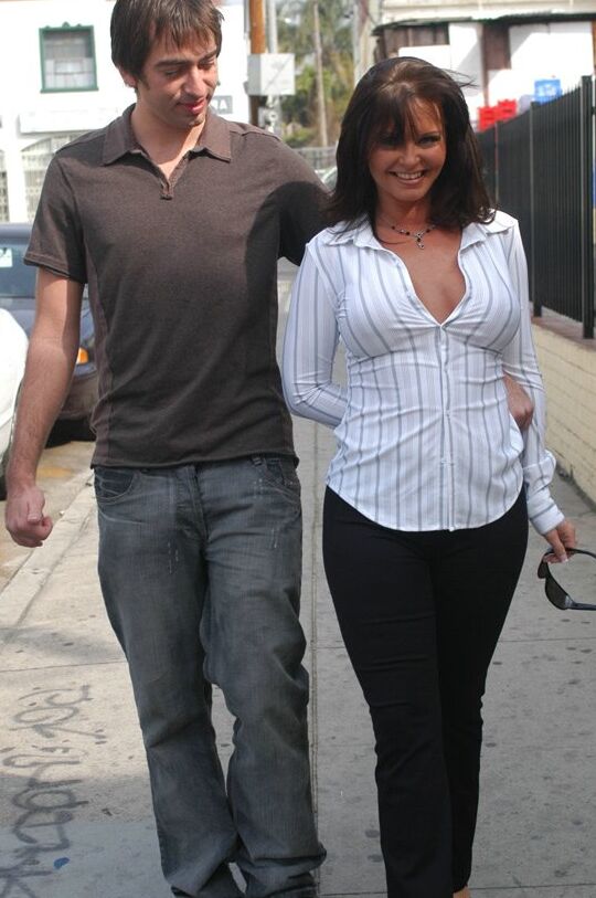17P Busty fully clothed mom Maya Devine flaunts big tits cleavage & gets picked up