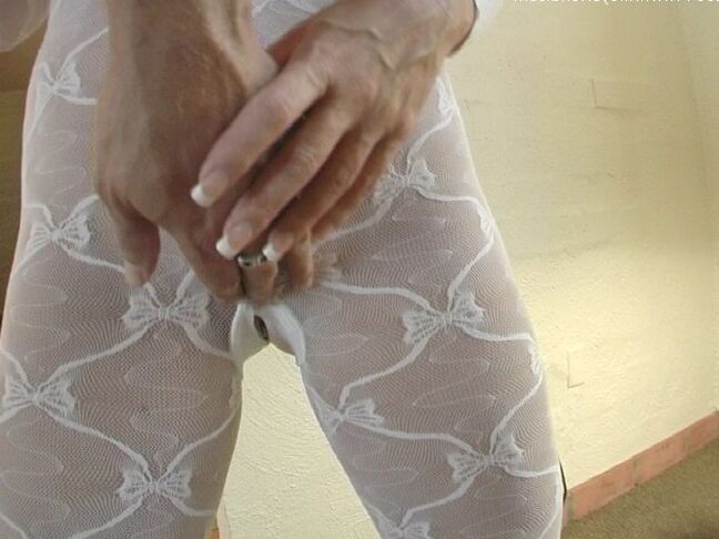 16P Older housewife Sandra Otterson releasing knockers from see thru stocking