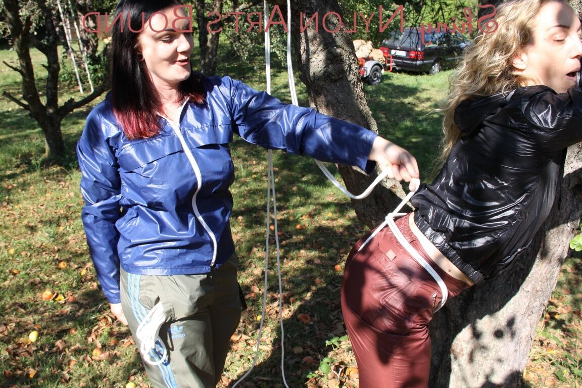 16P Watching Jill while she ties and gagges sophie on a tree both girls wearing a