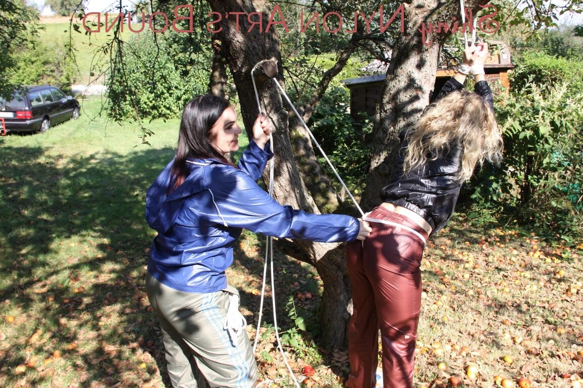 16P Watching Jill while she ties and gagges sophie on a tree both girls wearing a