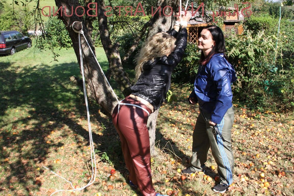 16P Watching Jill while she ties and gagges sophie on a tree both girls wearing a