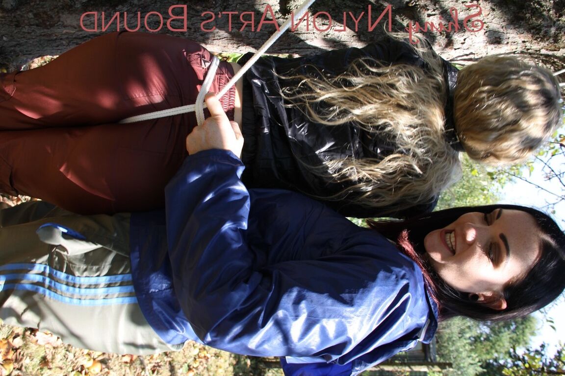 16P Watching Jill while she ties and gagges sophie on a tree both girls wearing a