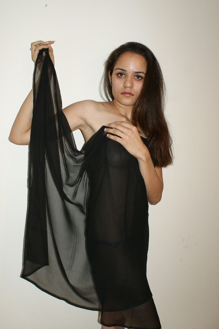 12P Jasmine exposing her juicy assets in net dress
