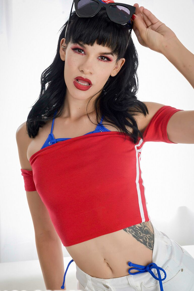 21P Fun-loving hottie Eden Sin poses in sexy shorts before exposing her tiny tits
