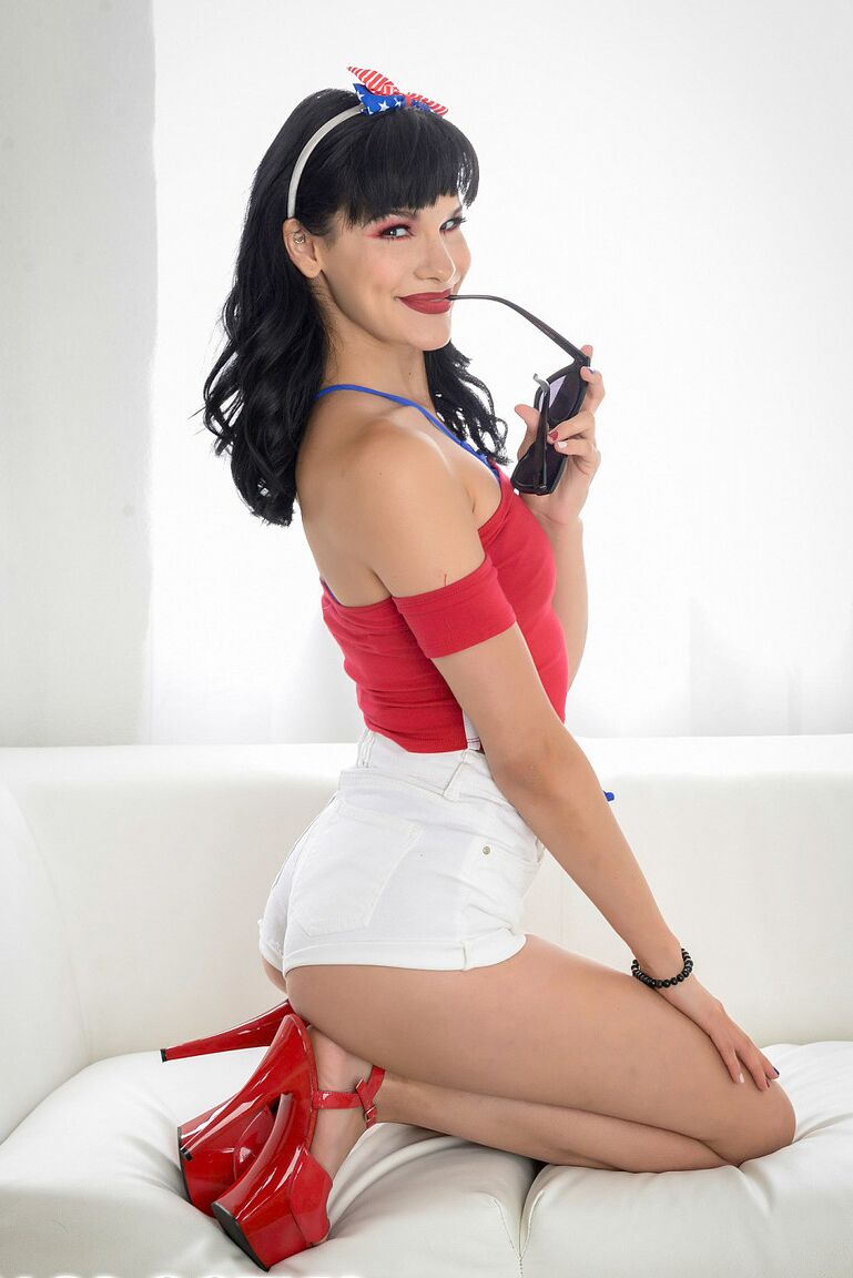 21P Fun-loving hottie Eden Sin poses in sexy shorts before exposing her tiny tits