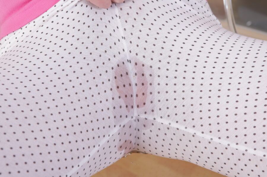 16P Innocent cutie Candi Peach is pissing in her white leggings!