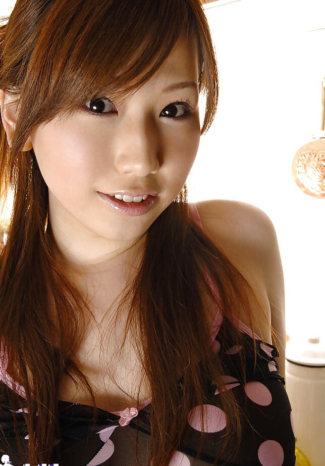 15P Stunning asian babe with big tits Ai Sayama stripping in the kitchen