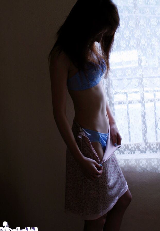 16P Seductive asian babe with neat fanny slowly slipping off her clothes