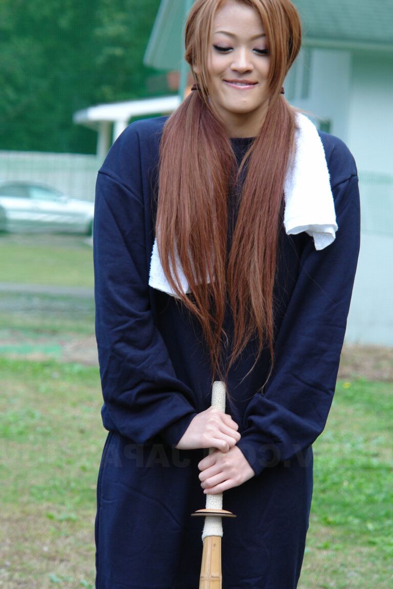 15P Japanese girl An Umemiya blows a small cock while fully dressed