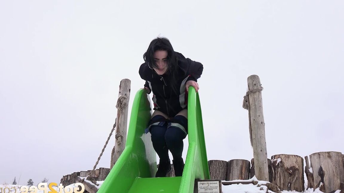 15P Public pissing for dark haired babe in the park