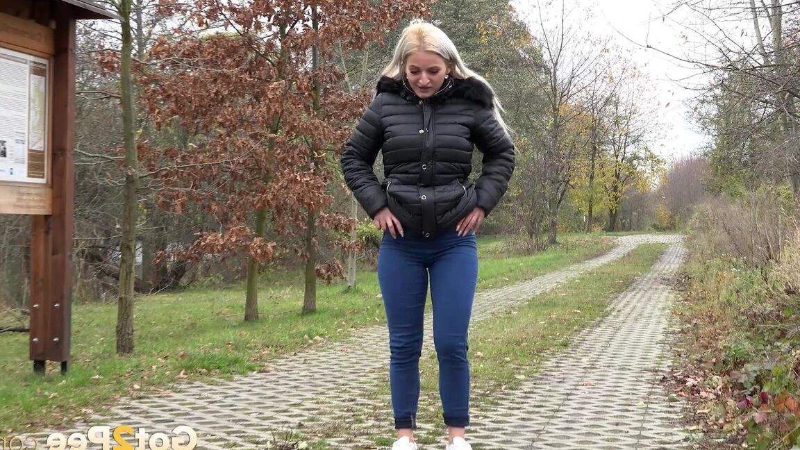 15P Blonde European pisses on a path on a trail