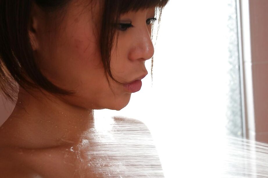 16P Smiley asian babe with perky nipples Shiho Matsushima taking shower