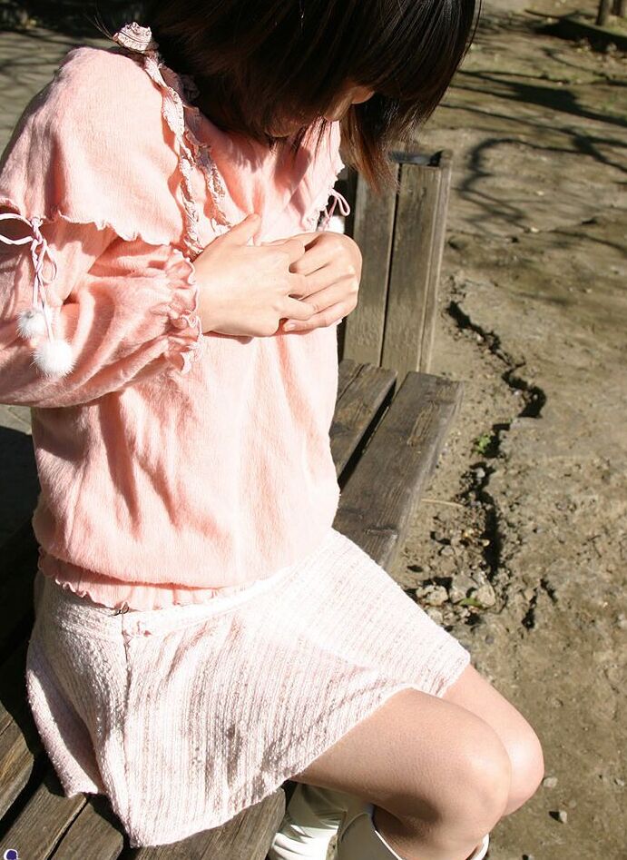 16P Japanese model Nana exposes her tits and bush in white latex boots