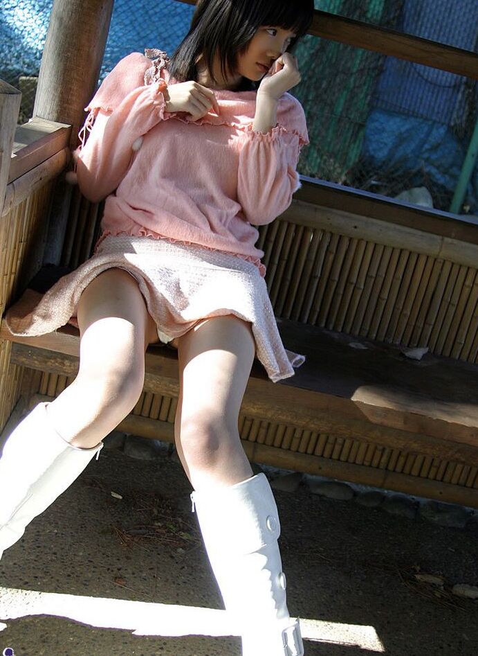 16P Japanese model Nana exposes her tits and bush in white latex boots