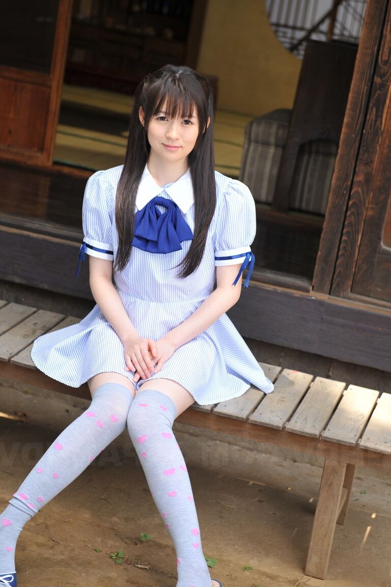 15P Japanese cutie Ai Uehara sits on the balcony and reveals her unshaved vagina