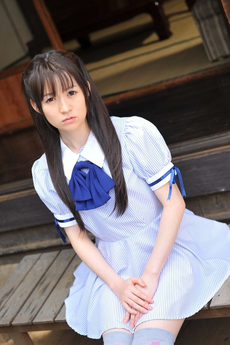 15P Japanese cutie Ai Uehara sits on the balcony and reveals her unshaved vagina