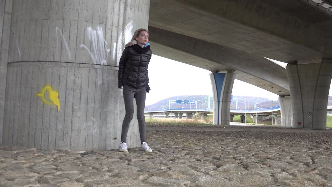 15P Short taken blonde squats for a piss underneath an overpass on a chilly day