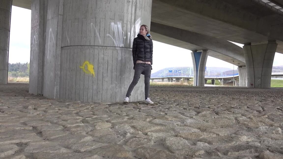 15P Short taken blonde squats for a piss underneath an overpass on a chilly day