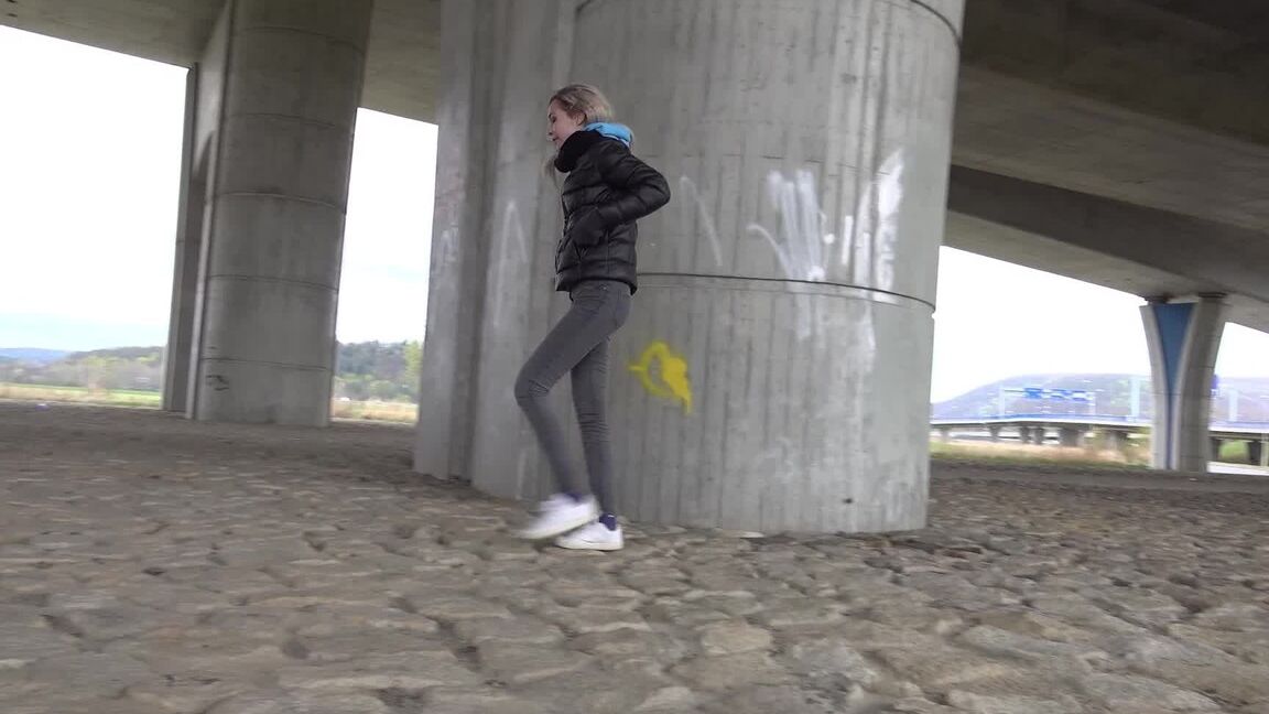 15P Short taken blonde squats for a piss underneath an overpass on a chilly day
