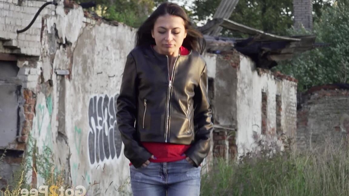 15P Petite brunette Natasha squats for a piss in a puddle on a gravel road