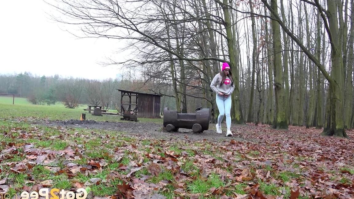 15P Caucasian chick takes a badly needed piss in a wooded location