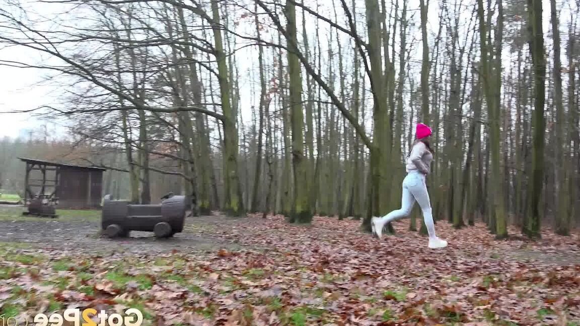 15P Caucasian chick takes a badly needed piss in a wooded location