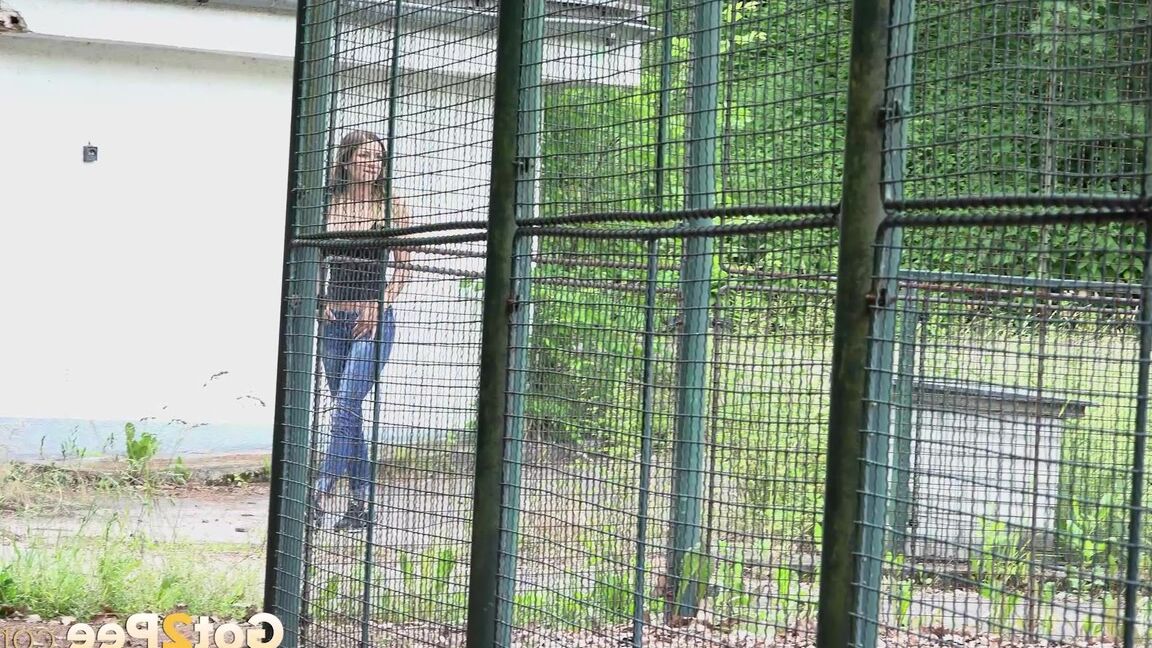 15P Sexy brunette Rebecca dropping jeans and white panties and pissing in public